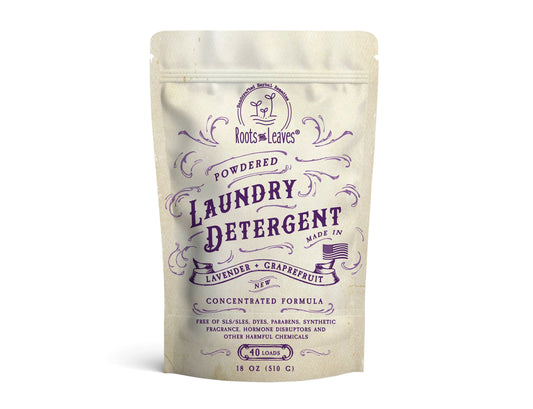 Roots and Leaves powdered laundry detergent with lavender and grapefruit scent in beige pouch Come see us at Awaken, Franklin, Tennessee