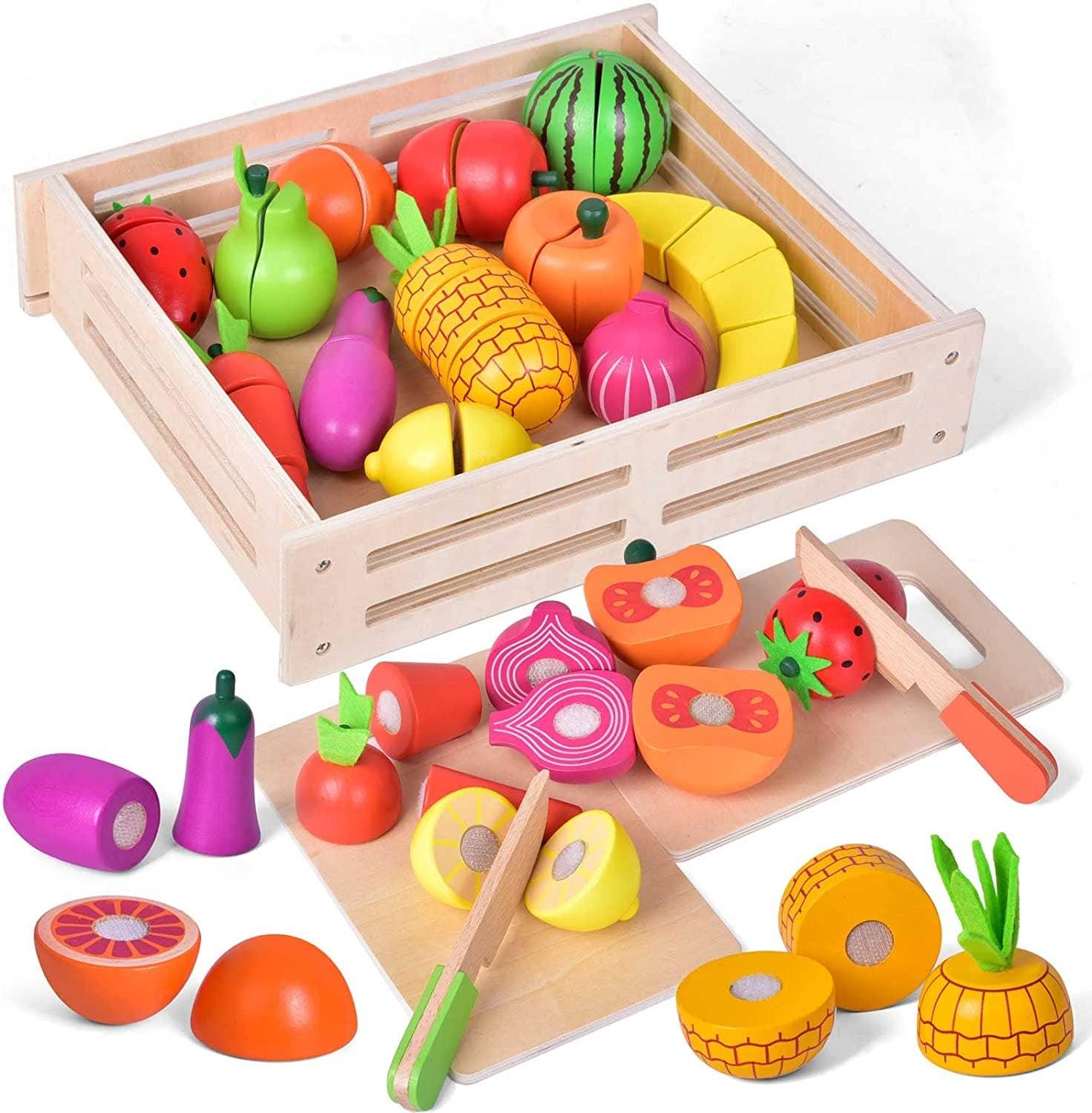 Wooden toy fruits and vegetables in a crate with cutting board, Come see us at Awaken, Franklin, Tennessee