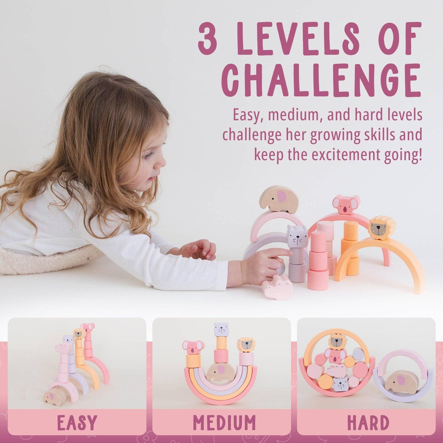Child playing with pastel wooden stacking toy showing easy, medium, hard challenge levels. Come see us at Awaken, Franklin, Tennessee