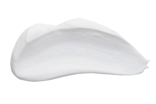 Smooth white cream or lotion smear on white background, skincare texture, Come see us at Awaken, Franklin, Tennessee