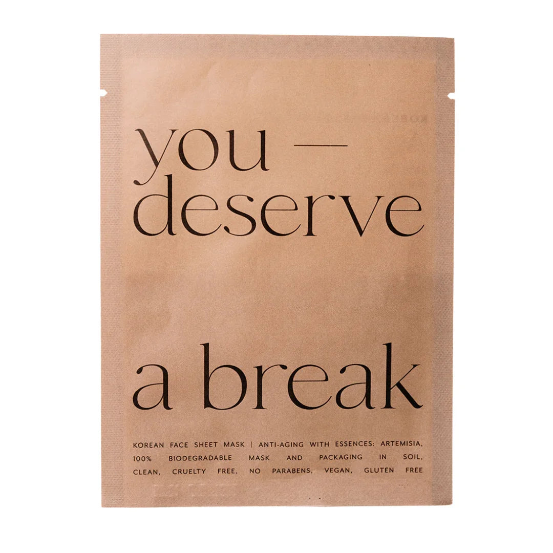 Korean face sheet mask brown packaging with 'you deserve a break' text, Come see us at Awaken, Franklin, Tennessee.