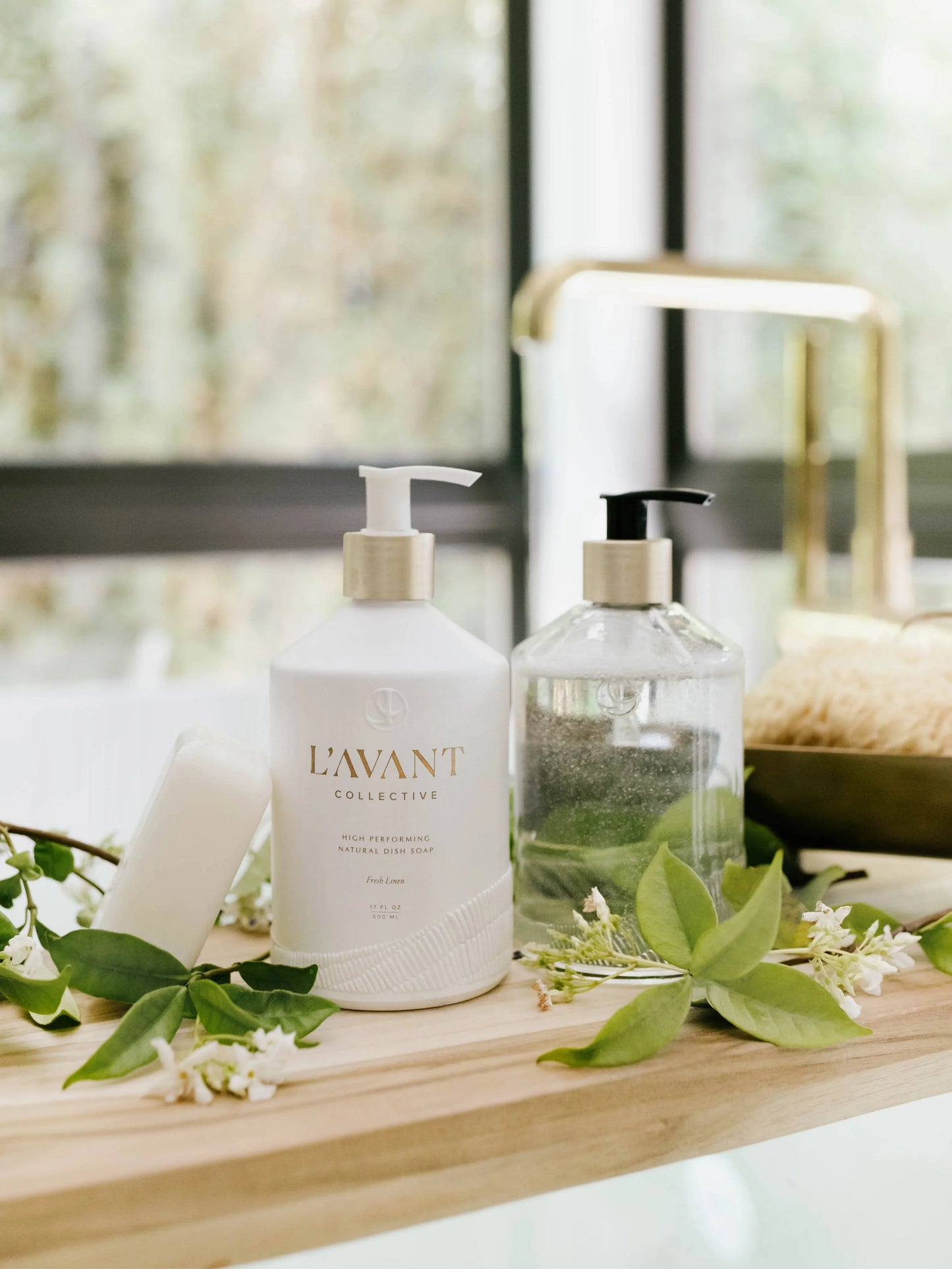L'AVANT Collective dish soap bottles with greenery, modern kitchen sink, Come see us at Awaken, Franklin, Tennessee.