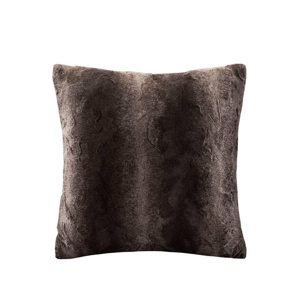 Soft dark brown faux fur decorative throw pillow on white background. Come see us at Awaken, Franklin, Tennessee