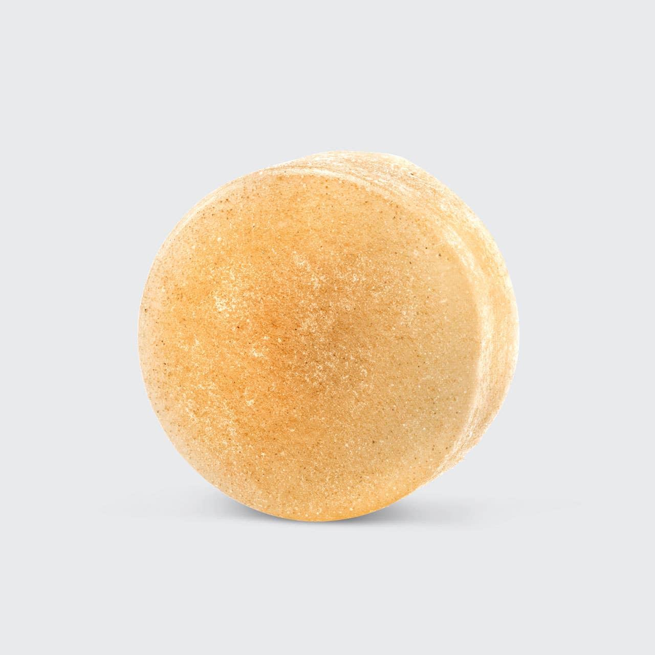 Natural solid shampoo bar on white background, Come see us at Awaken, Franklin, Tennessee