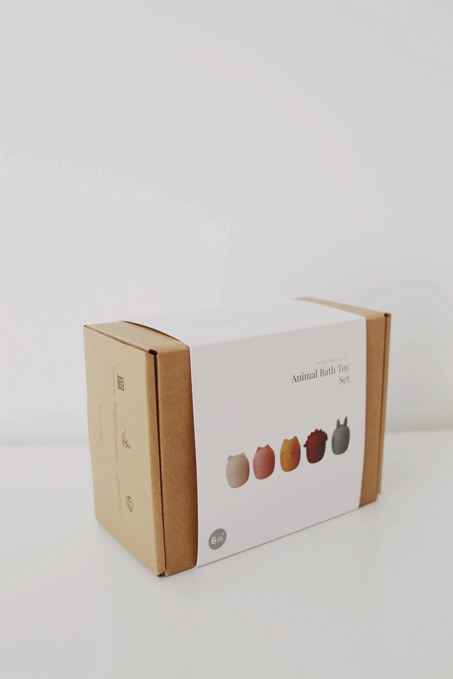 Animal bath toy set with five colorful animal shapes in eco-friendly packaging. Come see us at Awaken, Franklin, Tennessee