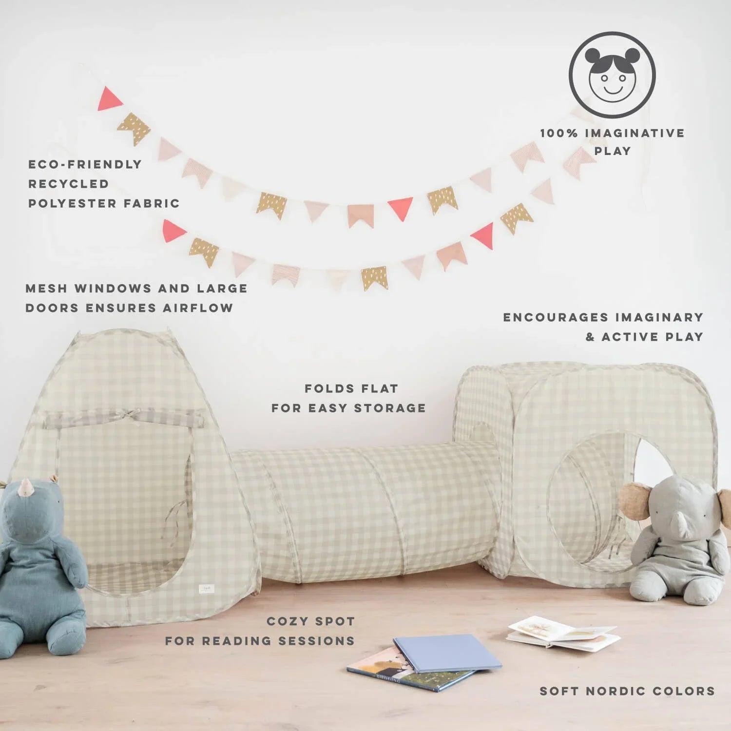 Children's beige plaid play tent with tunnel and cube, surrounded by plush toys and books. Come see us at Awaken, Franklin, Tennessee