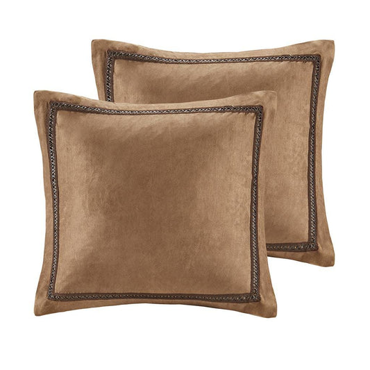 Set of two brown suede decorative throw pillows with stitched border detail. Come see us at Awaken, Franklin, Tennessee