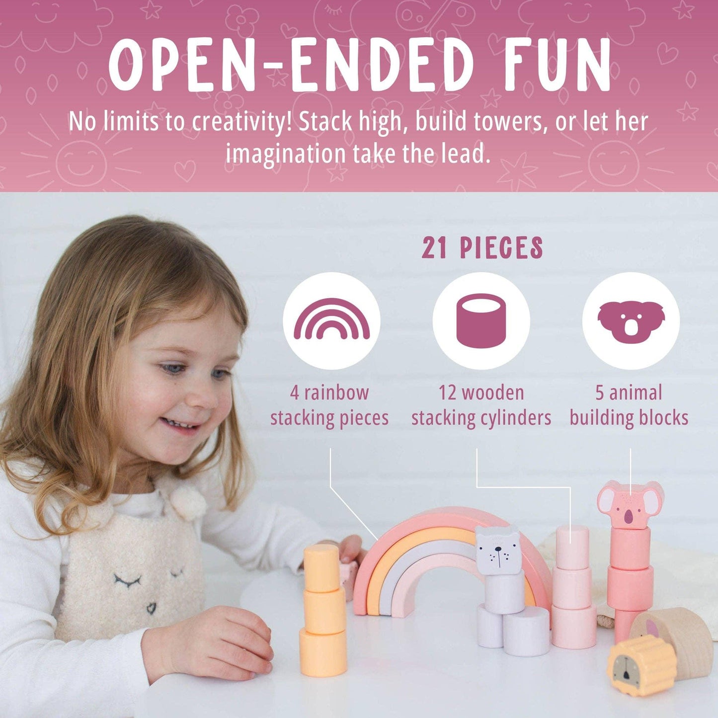 Young girl playing with pastel wooden stacking toys including rainbow, cylinders, and animal blocks. Come see us at Awaken, Franklin, Tennessee