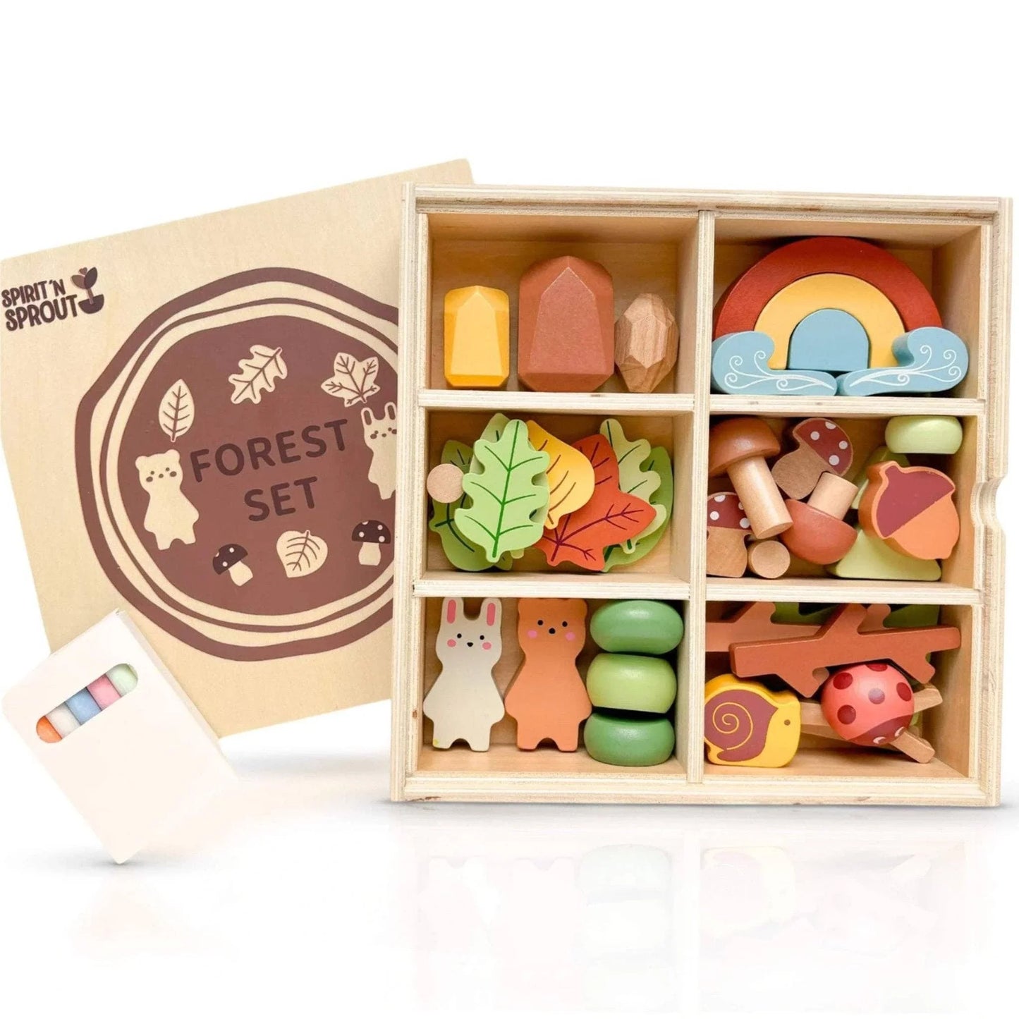 Wooden forest play set with animals, leaves, rainbow, and chalk in divided box, Come see us at Awaken, Franklin, Tennessee