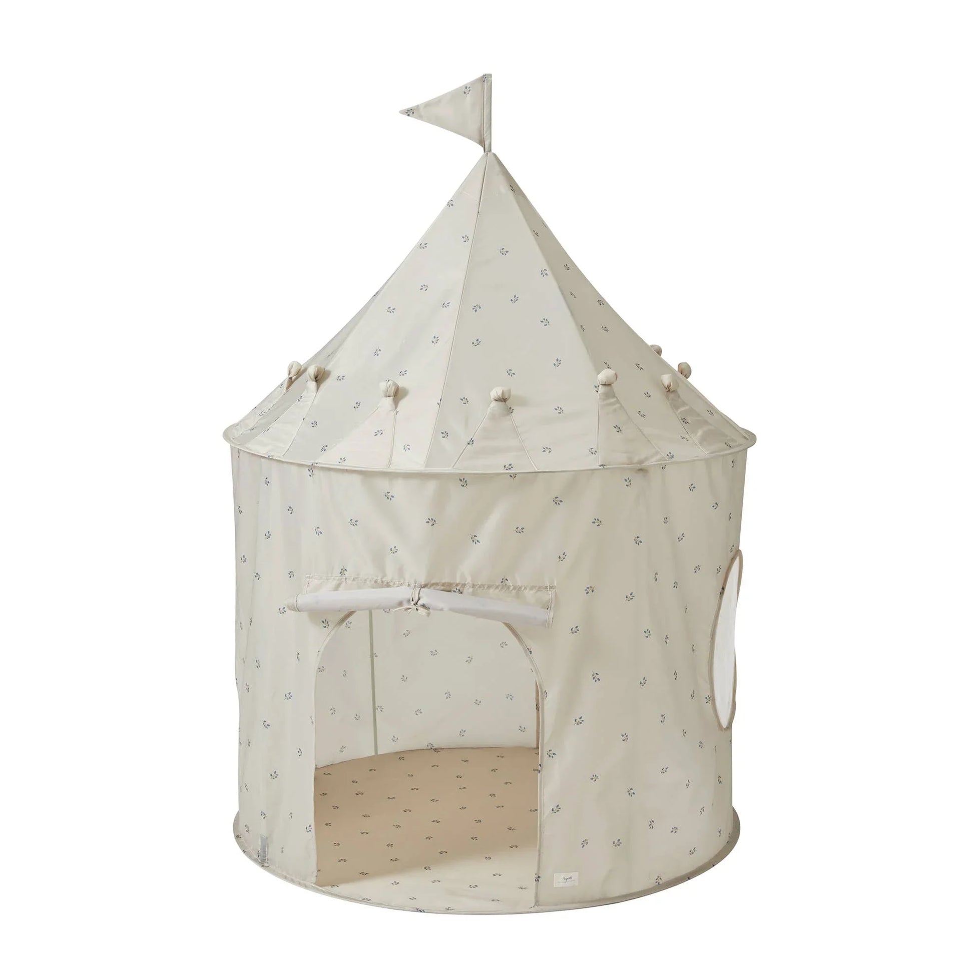 Beige children's play tent with small blue floral pattern, round window, and flag top, Come see us at Awaken, Franklin, Tennessee