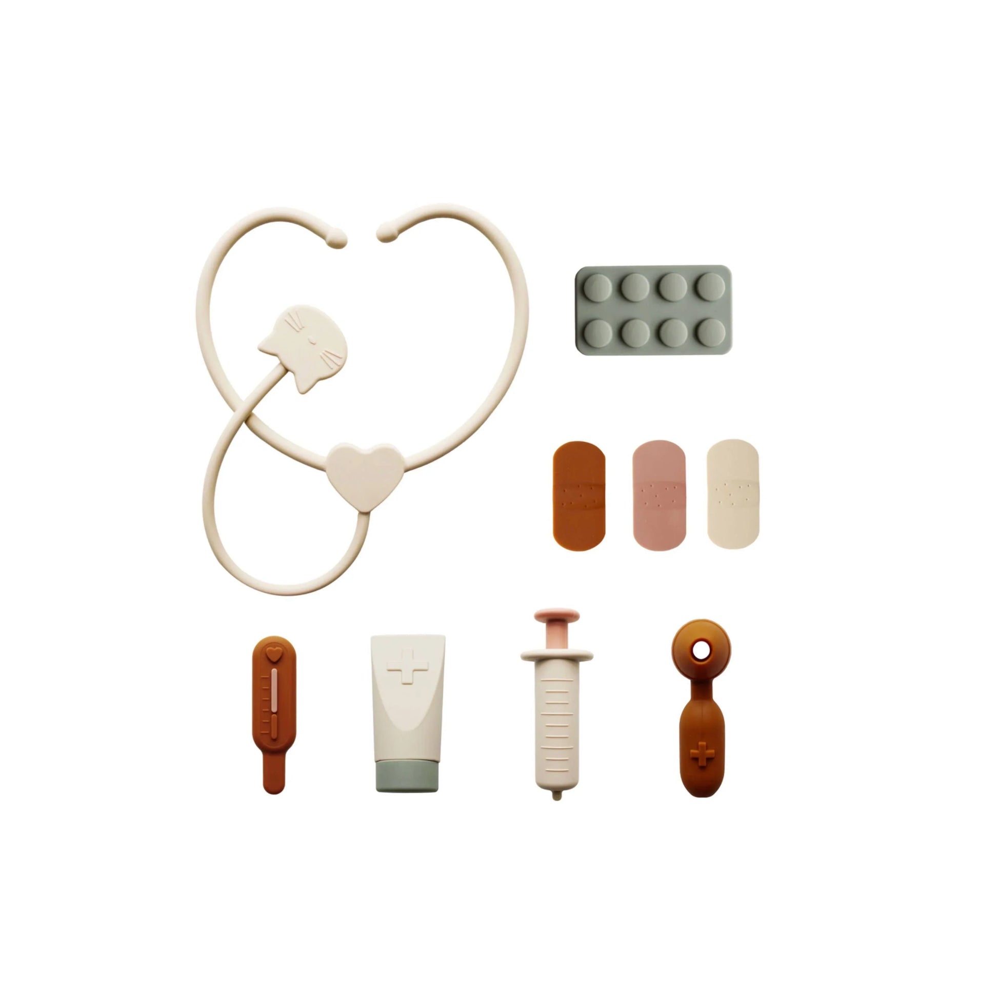Kids' medical toy set with stethoscope, syringe, bandages, thermometer, and pills. Come see us at Awaken, Franklin, Tennessee