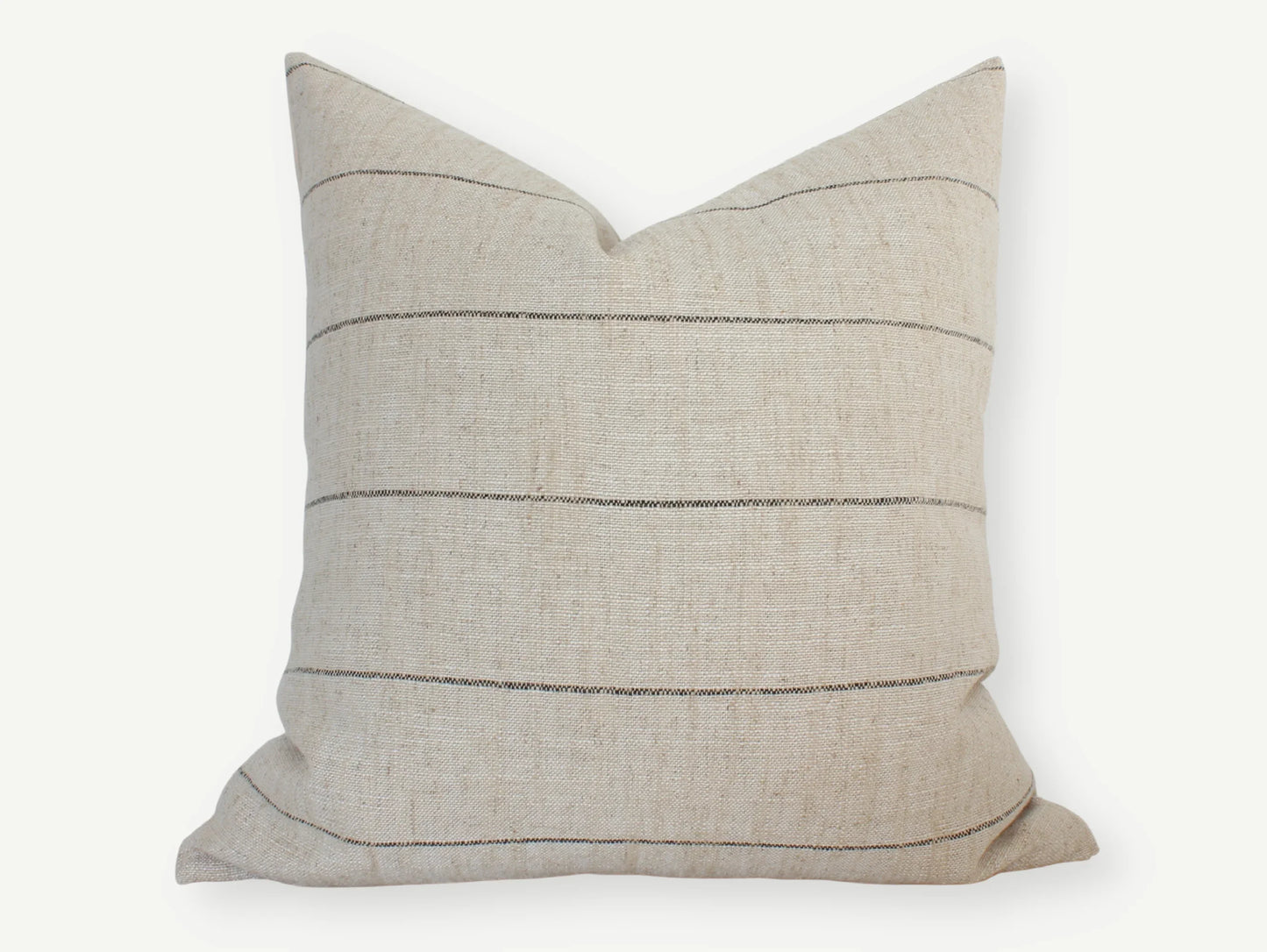 Beige textured throw pillow with thin horizontal stripes on white background. Come see us at Awaken, Franklin, Tennessee