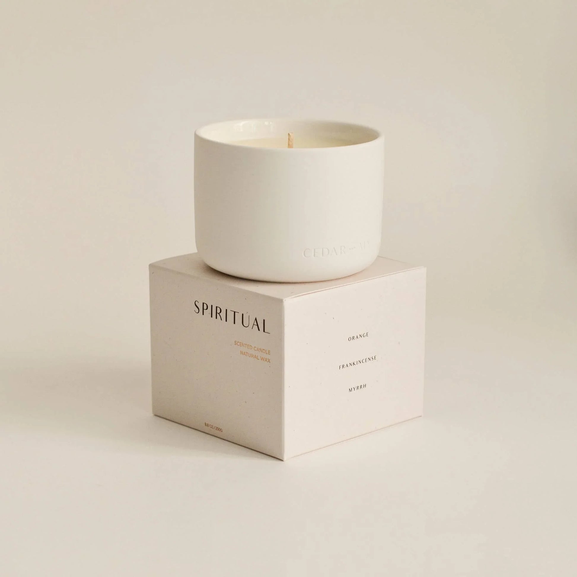 Minimalist white scented candle on SPIRITUAL box, natural wax, Come see us at Awaken, Franklin, Tennessee