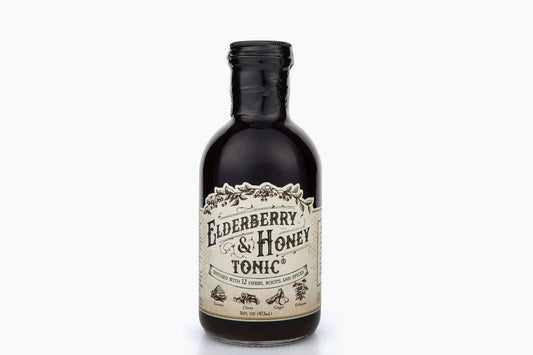 Bottle of Elderberry & Honey Tonic infused with 12 herbs including turmeric, cloves, ginger, and echinacea. Come see us at Awaken, Franklin, Tennessee