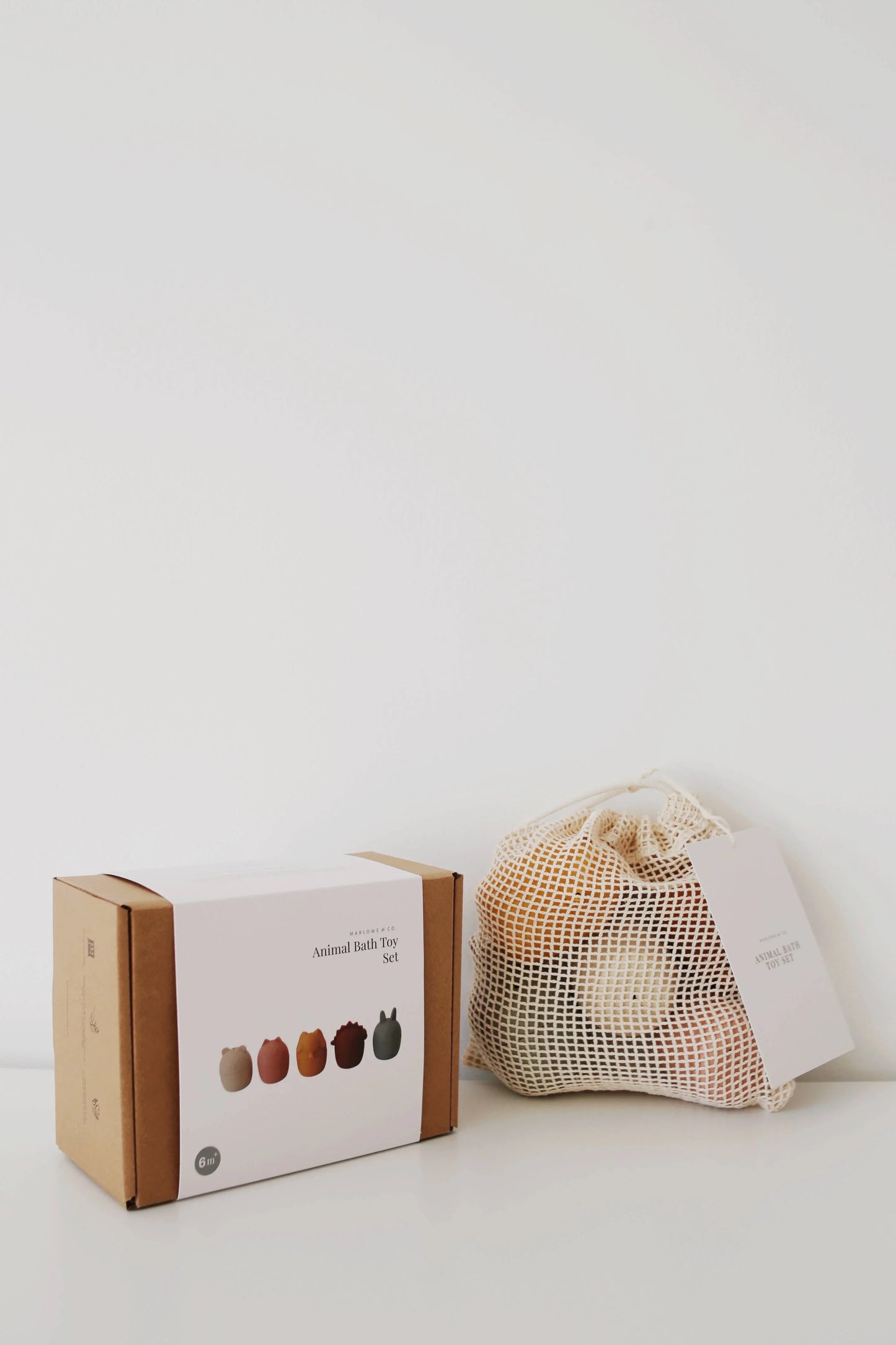 Animal Bath Toy Set in eco-friendly packaging with mesh bag, minimal design, Come see us at Awaken, Franklin, Tennessee