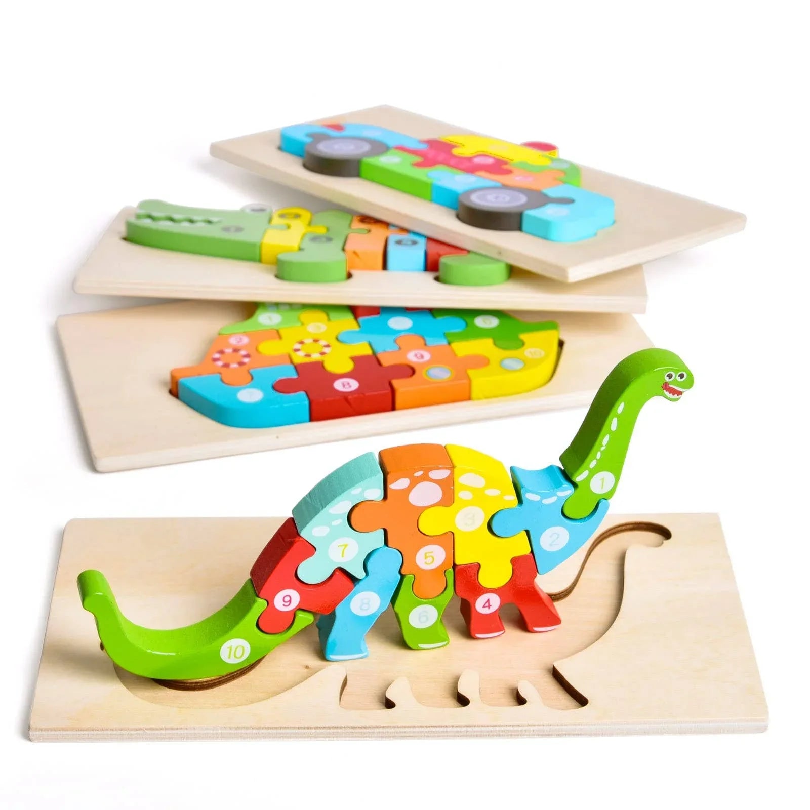 Colorful wooden dinosaur puzzle for kids, Come see us at Awaken, Franklin, Tennessee