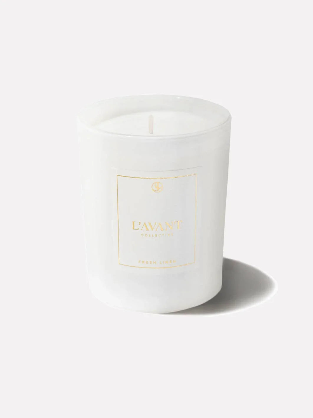 L'AVANT Collective Fresh Linen candle in white glass, Come see us at Awaken, Franklin, Tennessee