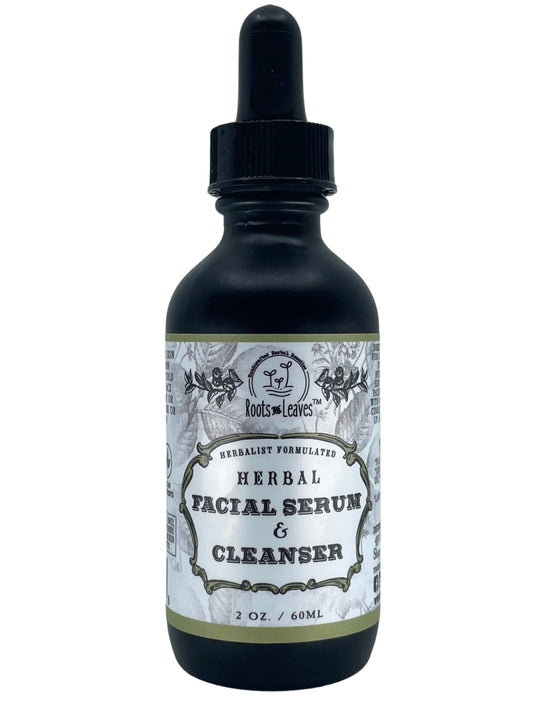 Roots & Leaves herbal facial serum and cleanser in black dropper bottle, 2 oz. Come see us at Awaken, Franklin, Tennessee