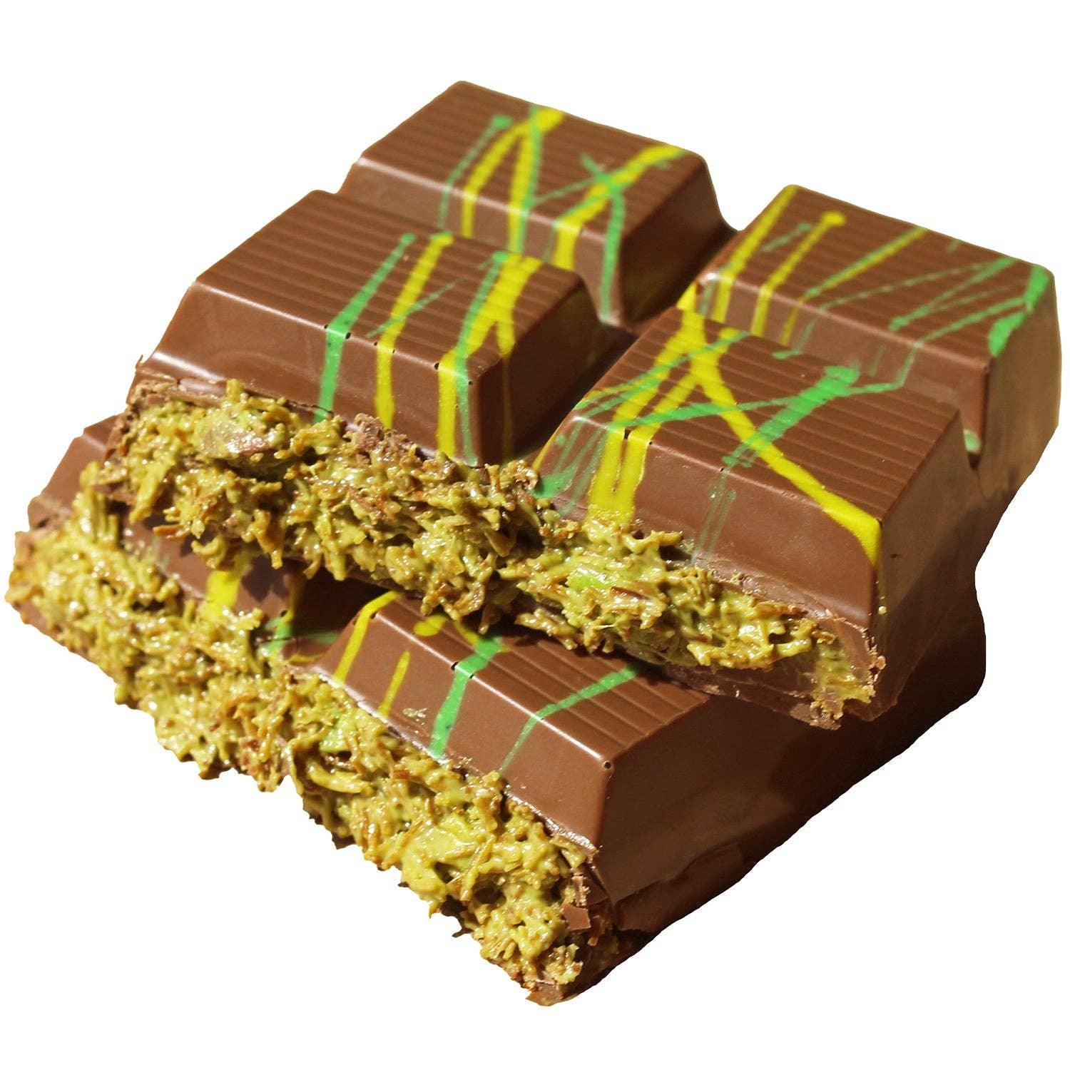 Chocolate bar with green and yellow drizzle, crispy filling, Come see us at Awaken, Franklin, Tennessee