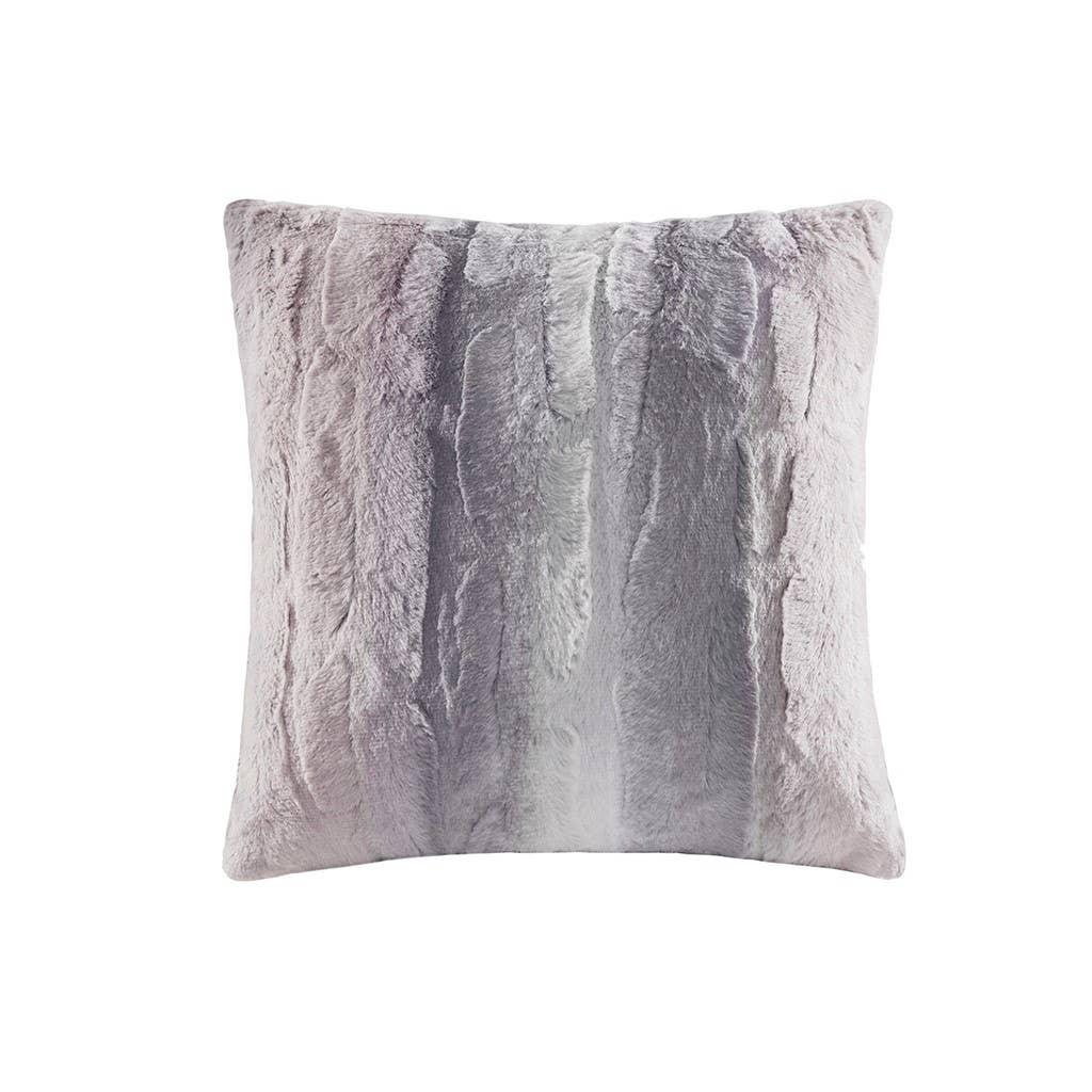 Soft faux fur square pillow in light gray and lavender tones. Come see us at Awaken, Franklin, Tennessee