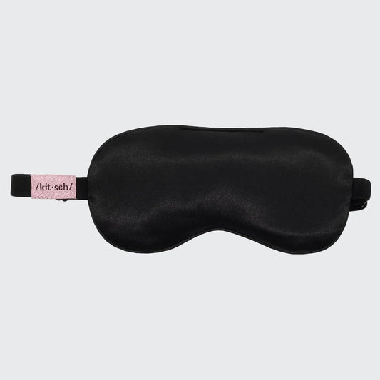 Black satin sleep mask with pink Kitsch label, Come see us at Awaken, Franklin, Tennessee