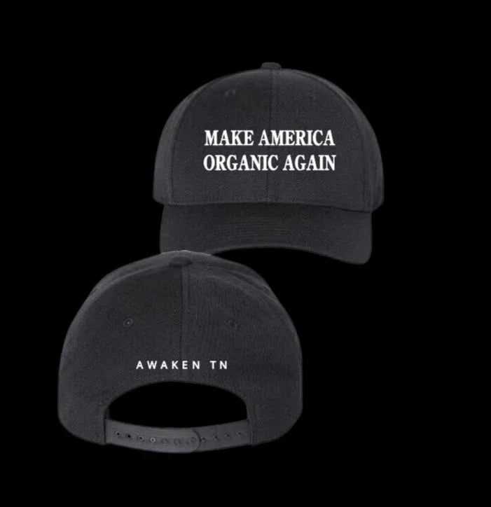 Black baseball cap with white text 'MAKE AMERICA ORGANIC AGAIN' front and 'AWAKEN TN' back. Come see us at Awaken, Franklin, Tennessee