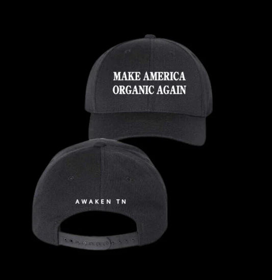 Black baseball cap with white text 'MAKE AMERICA ORGANIC AGAIN' front and 'AWAKEN TN' back. Come see us at Awaken, Franklin, Tennessee