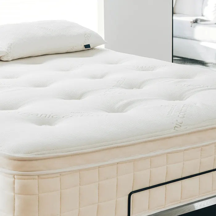 Organic pillow-top mattress and pillow in modern bedroom, Come see us at Awaken, Franklin, Tennessee